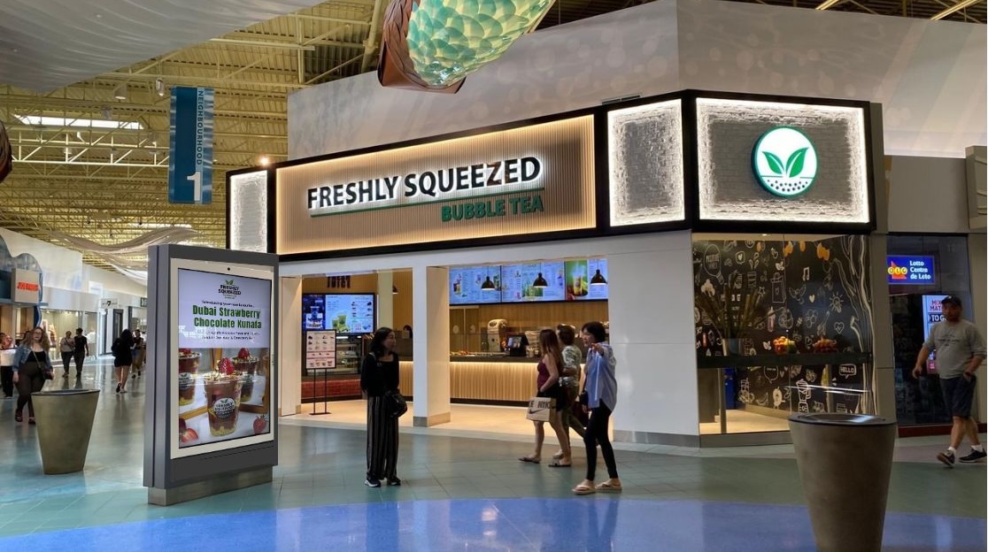 Freshly Squeezed store at Vaughan Mills with exterior signage and entrance